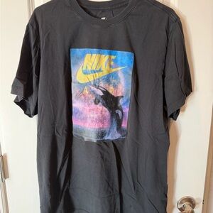 Nike Black Short-Sleeve Tee with Yellow Swoosh and Ocean Graphic